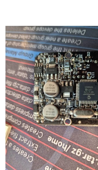 Controller board with the microcontroller in TQFP, the 10 MHz crystal and the pin header to the electrode board. Markings blurred.