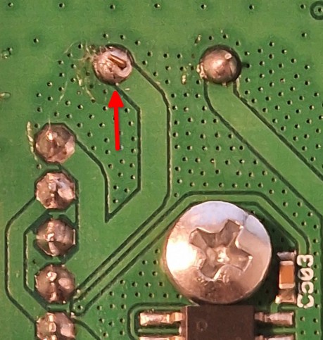 Bad solder joint next to a good one